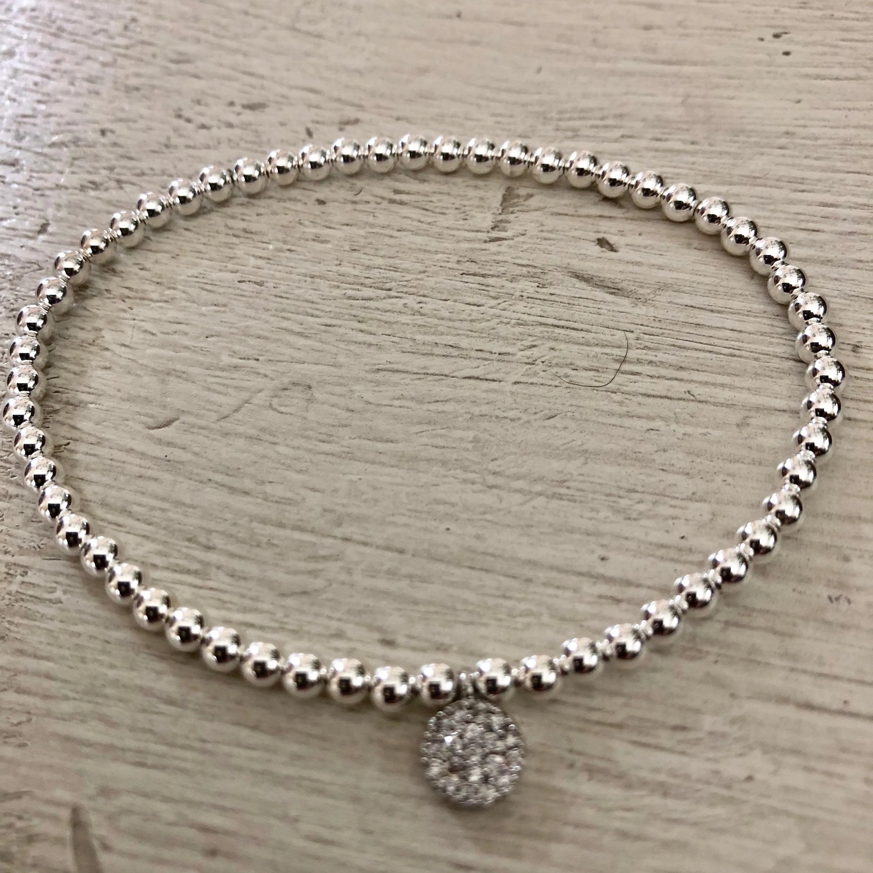 3mm Bead Stretch Bracelet with Matching Cubic Zirconia Round Disc Charm
