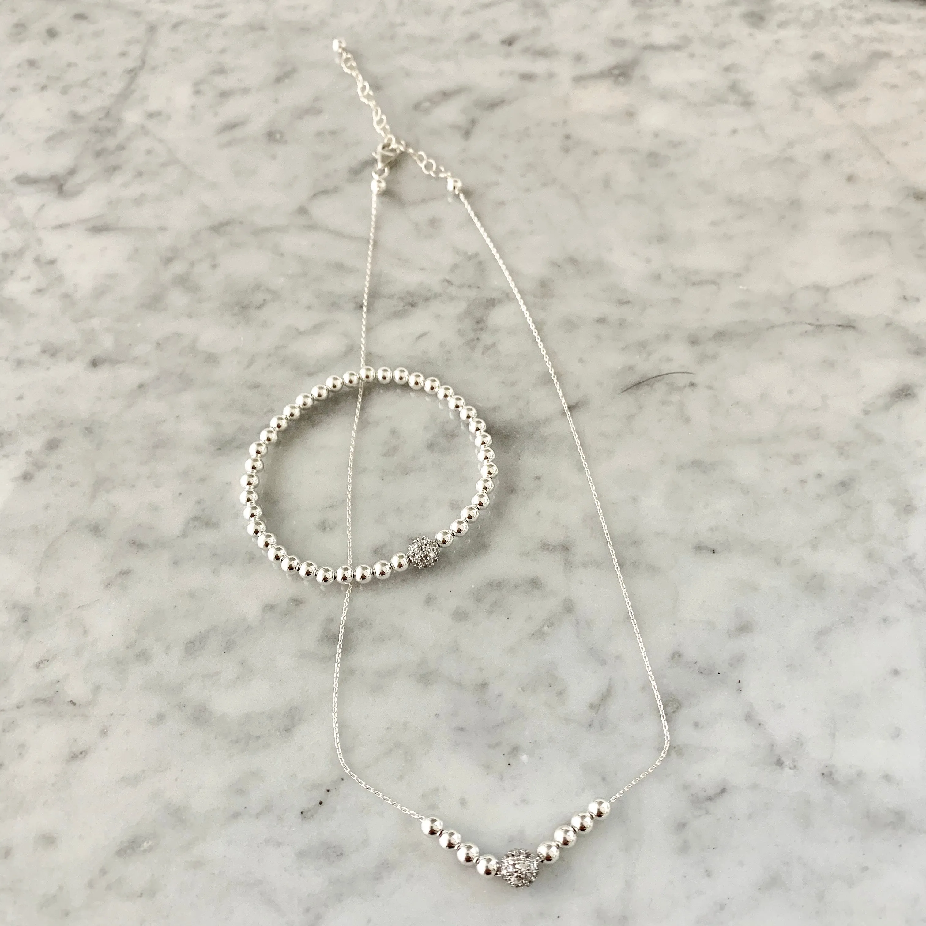 4mm Beaded Bracelet Adorned with a 6mm SS/CZ Pave' Bead