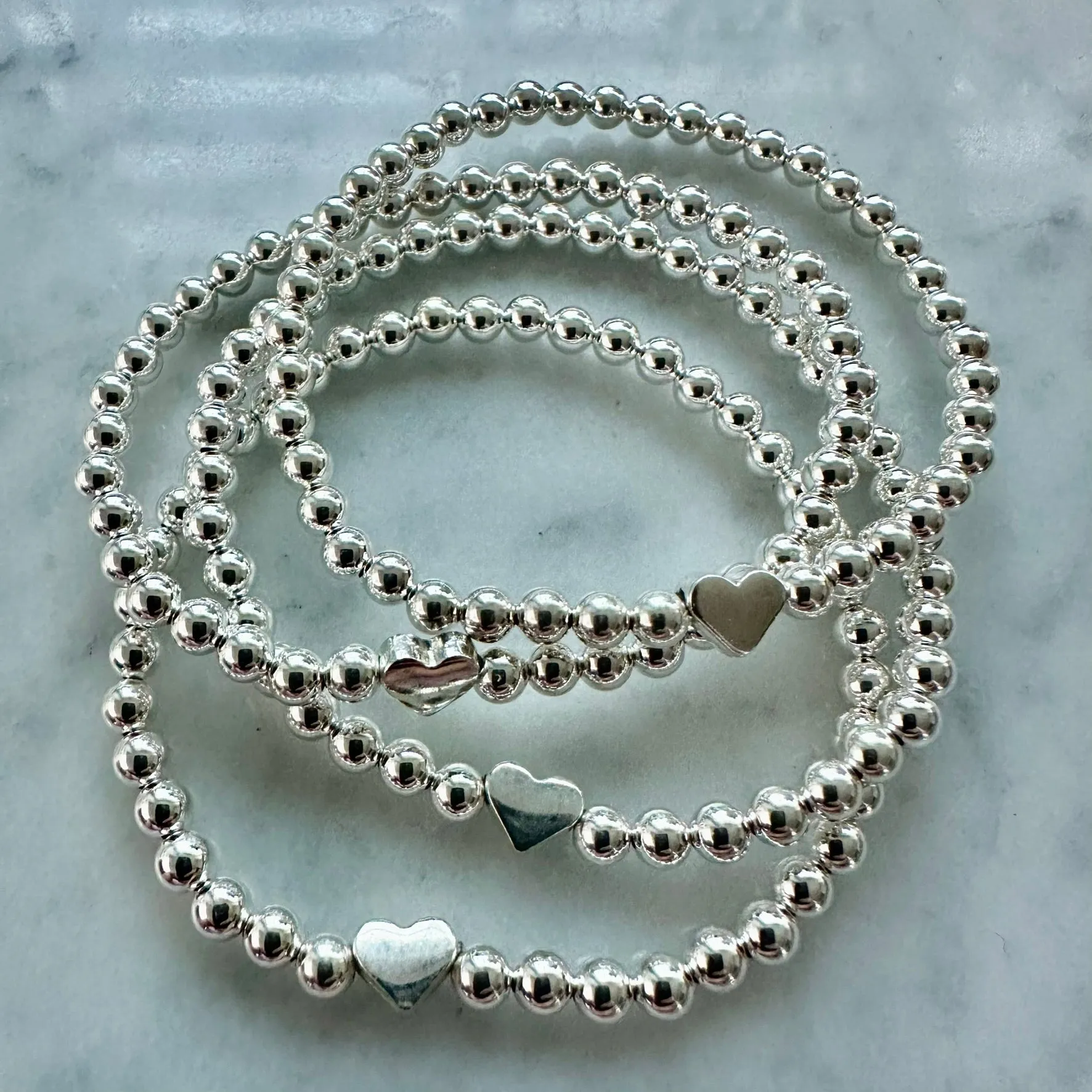 4mm Beaded Bracelet Adorned with One Heart Bead