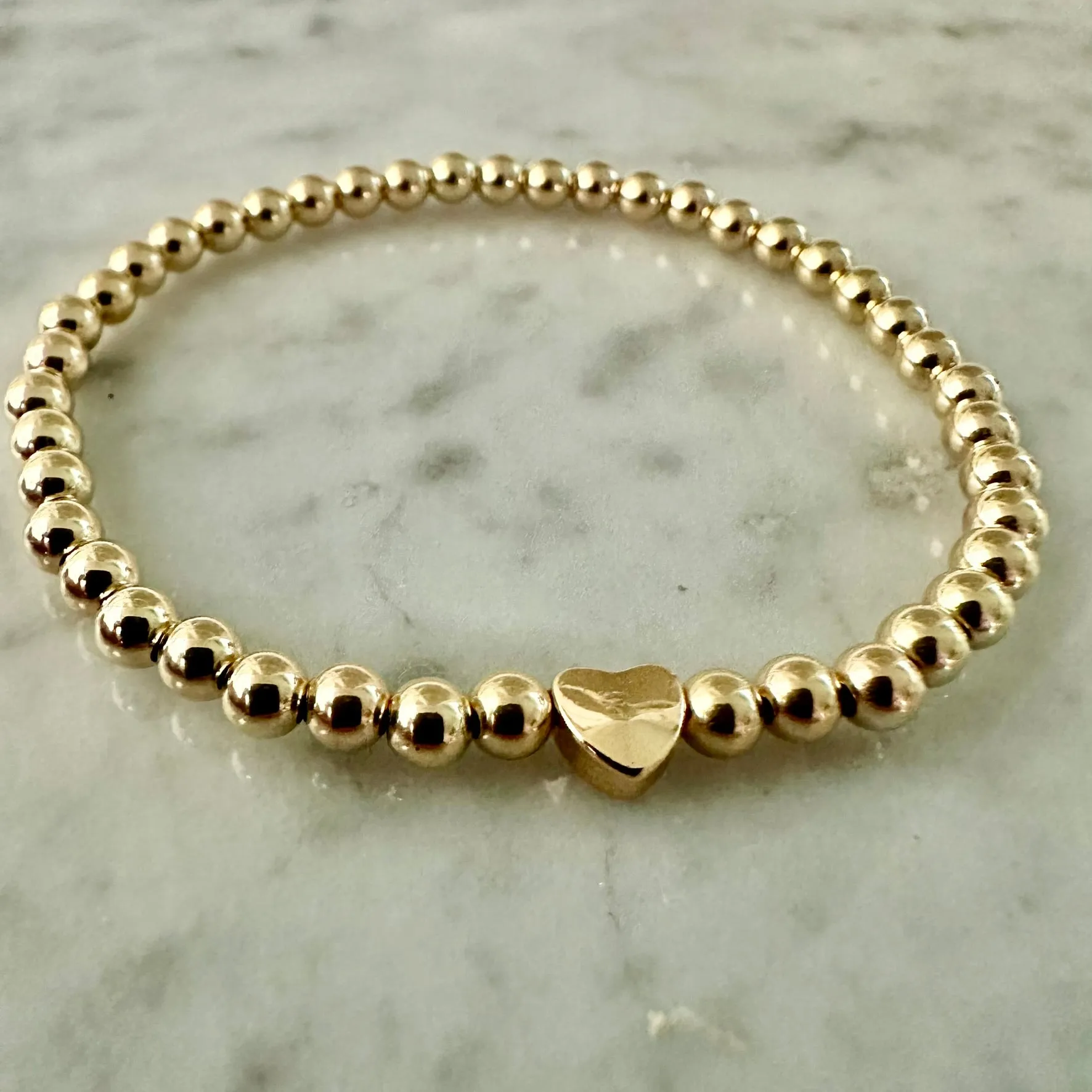 4mm Beaded Bracelet Adorned with One Heart Bead