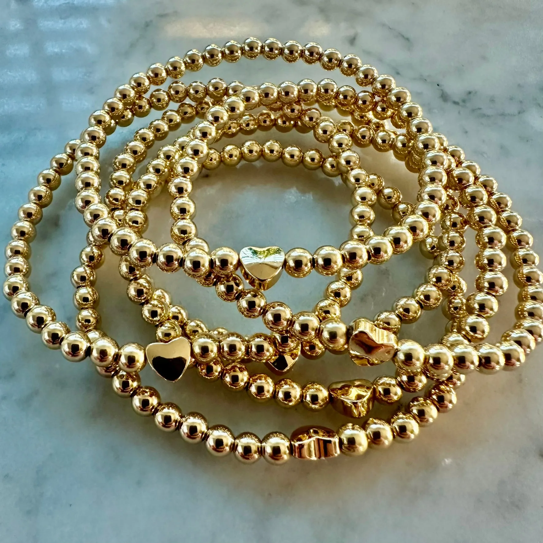4mm Beaded Bracelet Adorned with One Heart Bead