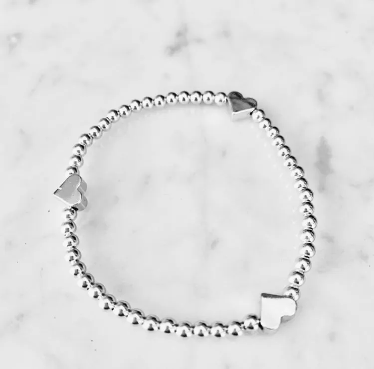 4mm Beaded Bracelet Adorned with Three Heart Beads