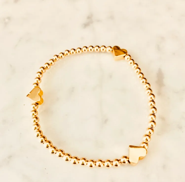 4mm Beaded Bracelet Adorned with Three Heart Beads